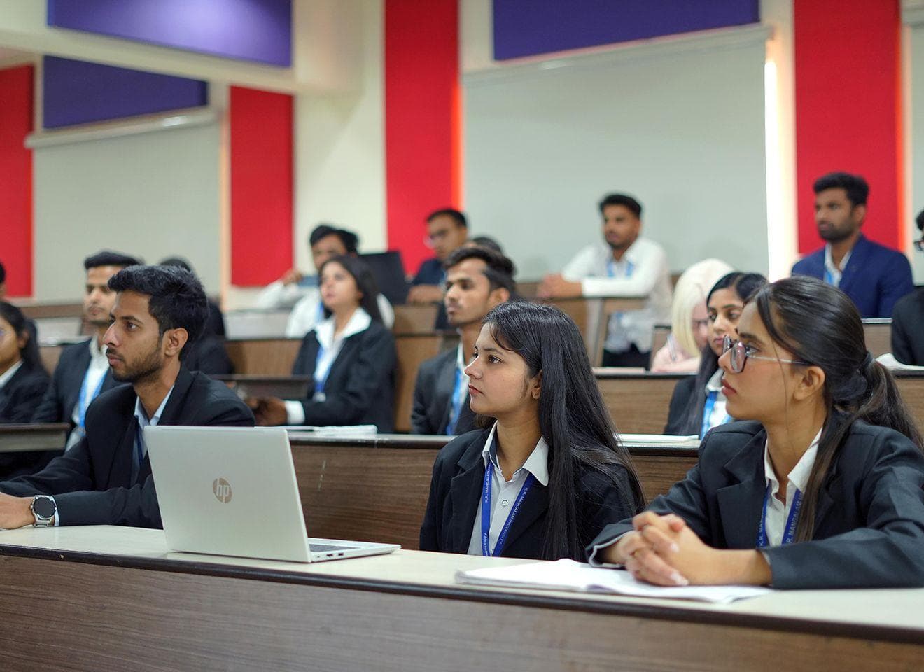 Management students in a business-school lecture hall